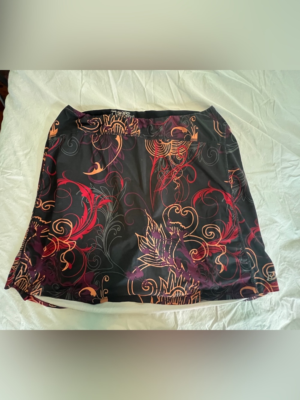 SkirtSports Black Mini Skirt with Red and Purple Floral Swirls